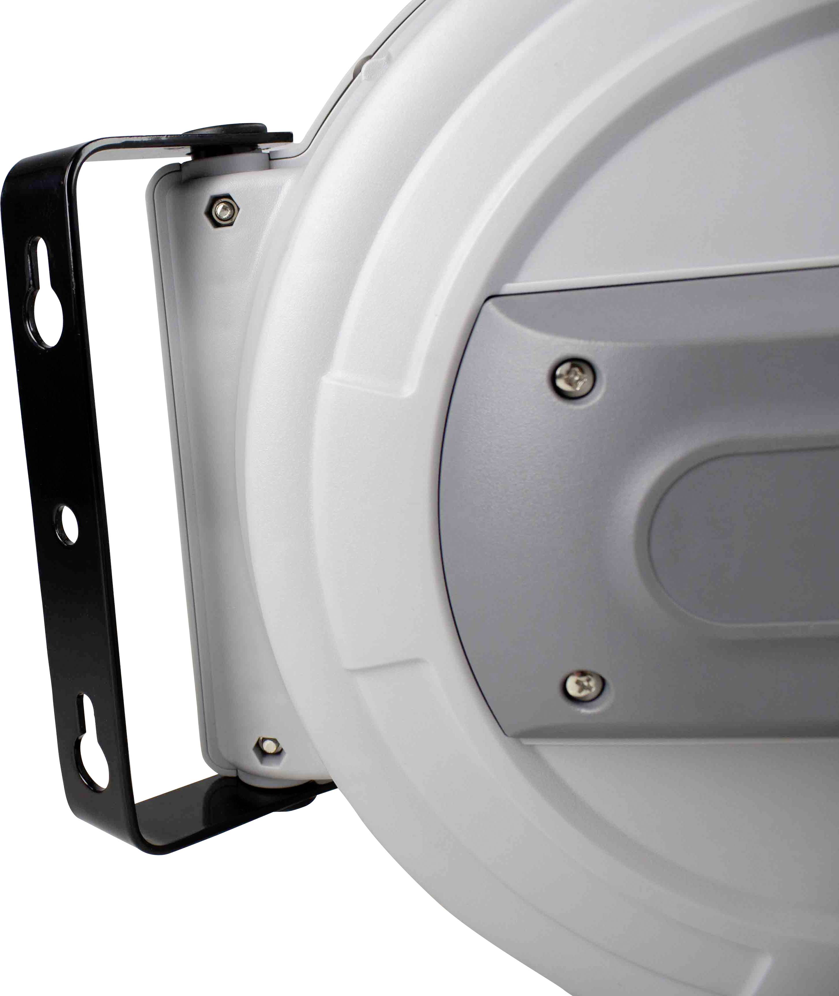 Gros plan d'un boîtier en plastique blanc et rond, avec une section centrale grise et des supports métalliques noirs. Il semble faire partie d'un dispositif technique.