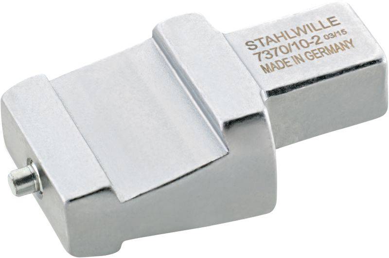 Adaptateur métallique portant l'inscription 'STAHLWILLE 737/10/10-2 03/15 MADE IN GERMANY', probablement destiné aux outils.