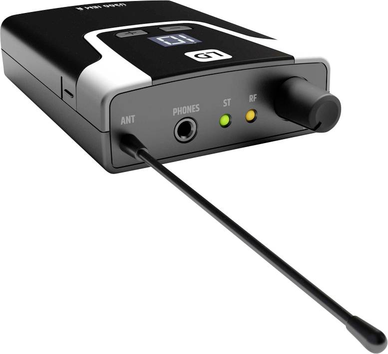 Un émetteur de moniteur intra-auriculaire noir avec antenne, connexion pour écouteurs, deux voyants LED et un potentiomètre de volume sur la face avant.