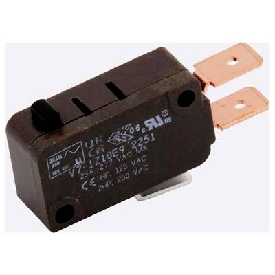 Un micro-interrupteur brun avec des bornes métalliques et des spécifications gravées, typiquement utilisé dans les circuits électroniques pour contrôler des appareils.