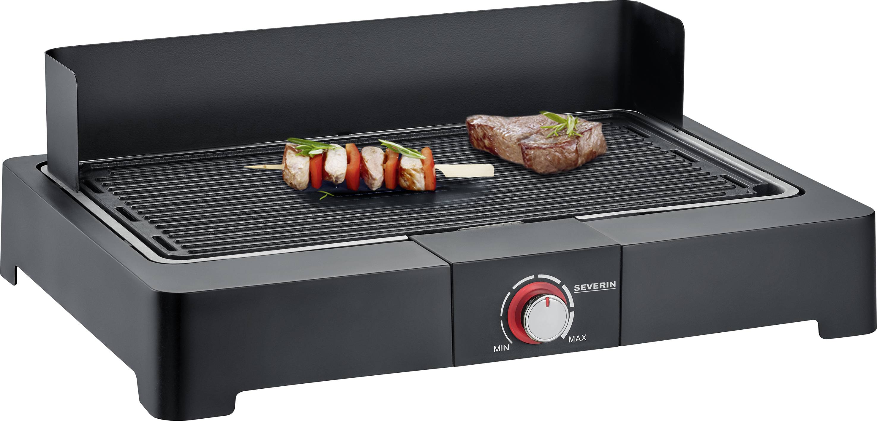 Un grill de table noir avec un régulateur de température réglable. Sur la grille se trouvent un morceau de viande et une brochette de légumes.