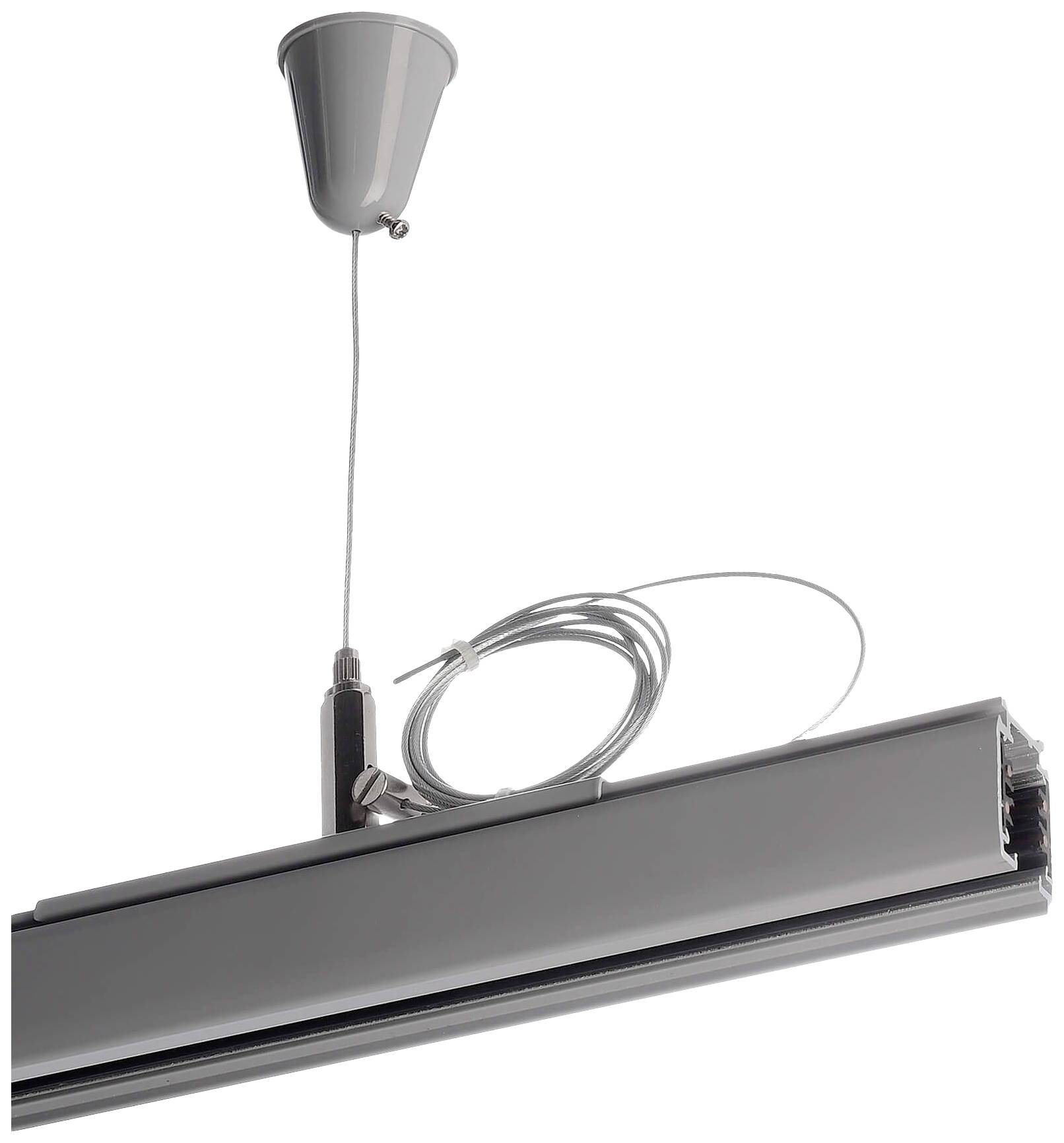Un luminaire de plafond gris monté sur un câble, avec un mécanisme de traction de câble.