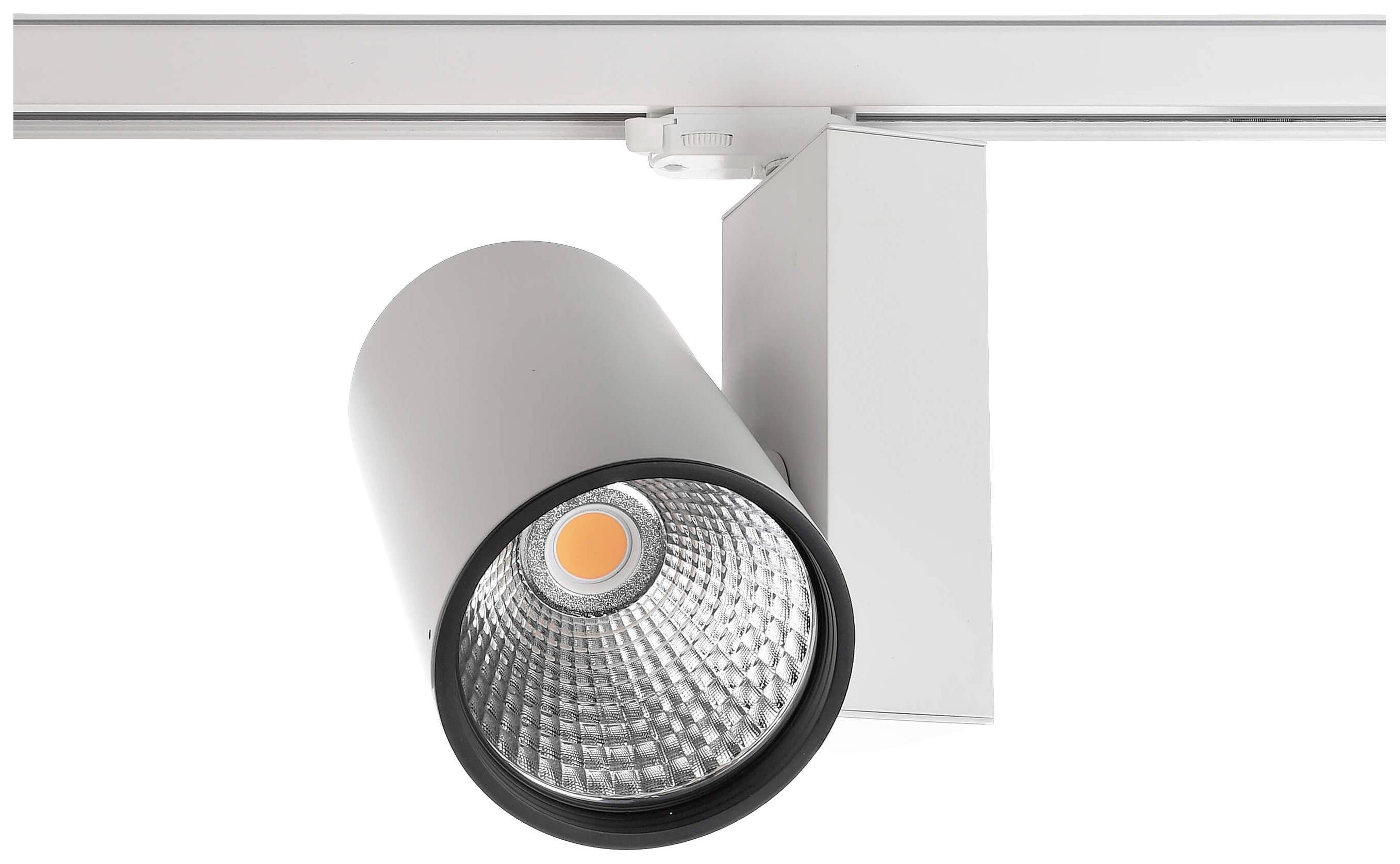Un projecteur LED blanc unique, au boîtier cylindrique, est monté au plafond, adapté pour un éclairage ciblé.