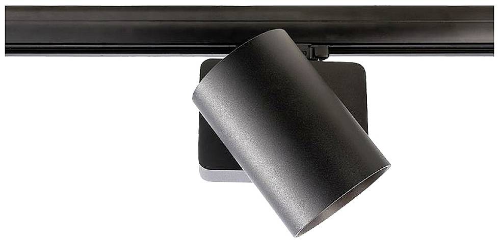 Un projecteur spot noir cylindrique est monté sur une rail de plafond.