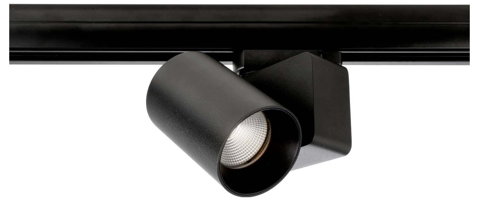 Spot cylindrique réglable noir monté sur une base rectangulaire de plafond, présenté sur fond blanc.