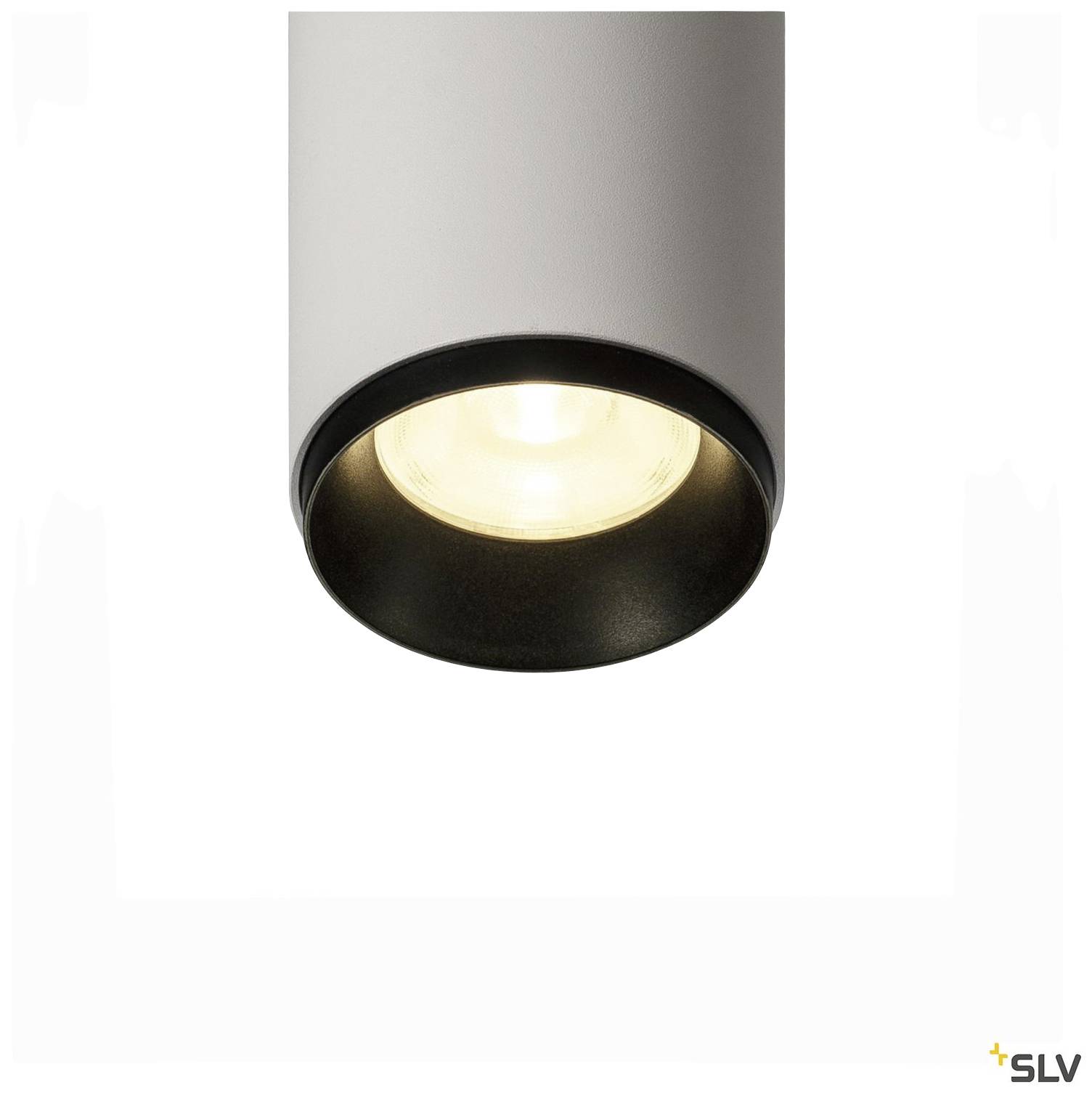 Plafonnier cylindrique avec boîtier métallique et lampe LED intégrée, vu de dessous, diffusant une lumière blanche chaude.