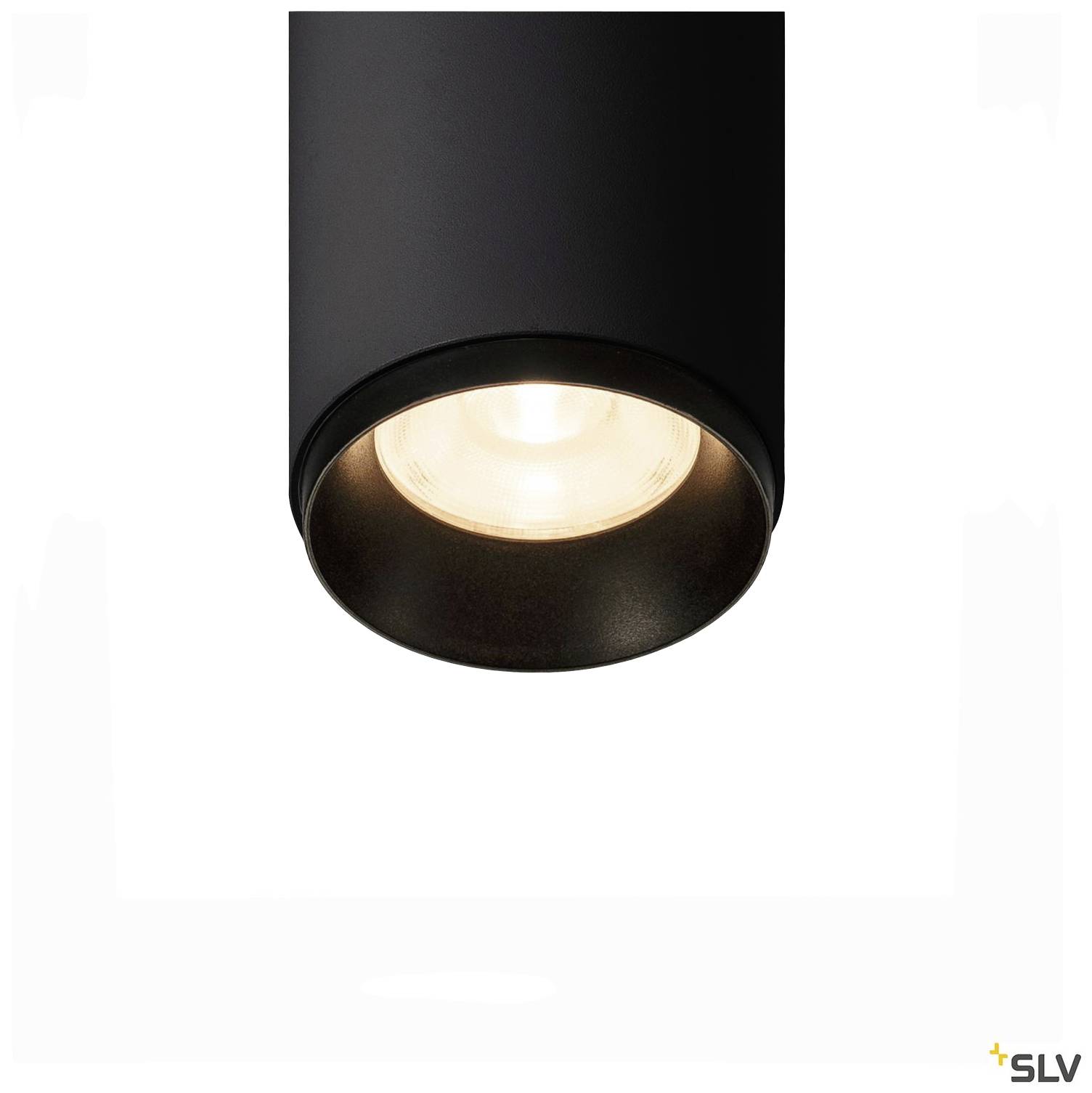 Un luminaire de plafond noir de forme cylindrique avec une source lumineuse visible dirigeant la lumière directement vers le bas.