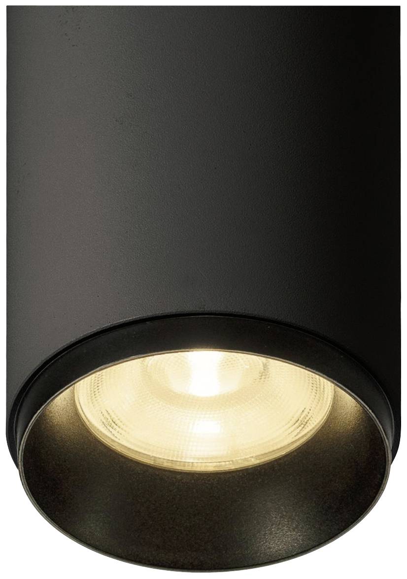 Plafonnier cylindrique noir qui diffuse une lumière chaleureuse. Idéal pour l'éclairage d'intérieurs modernes.