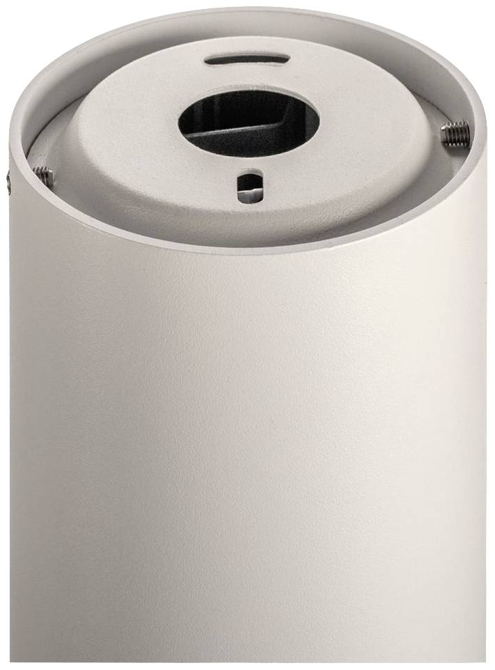 Un objet cylindrique simple en métal, probablement un support de lampe, avec une ouverture centrale et un filetage pour vis.