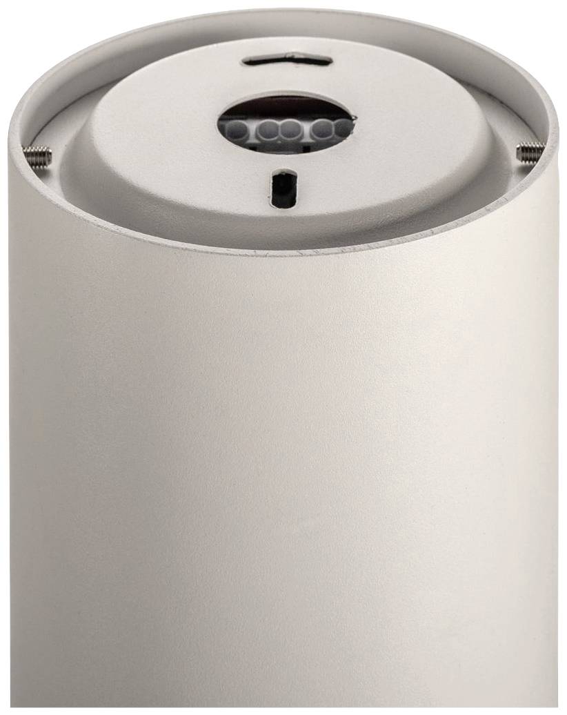 Un boîtier cylindrique de couleur crème, doté d'une ouverture pour caméra ou capteur sur le dessus, fixé par des vis.