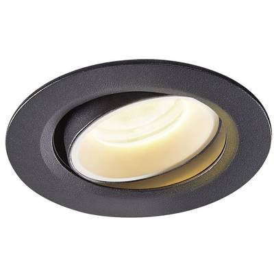 Un spot encastrable rond noir avec un élément LED orientable qui diffuse une lumière blanc chaud.