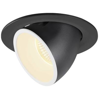 Un spot encastrable noir, rond, équipé d'une LED orientable, diffusant une lumière chaleureuse. Idéal pour l'éclairage intérieur moderne.