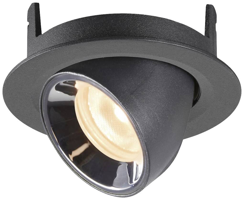 Un spot encastrable noir et rond avec un projecteur intérieur orientable diffuse une lumière chaleureuse.