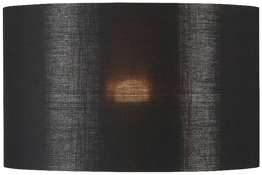 Une lampe cylindrique sombre avec une lueur chaleureuse au centre.