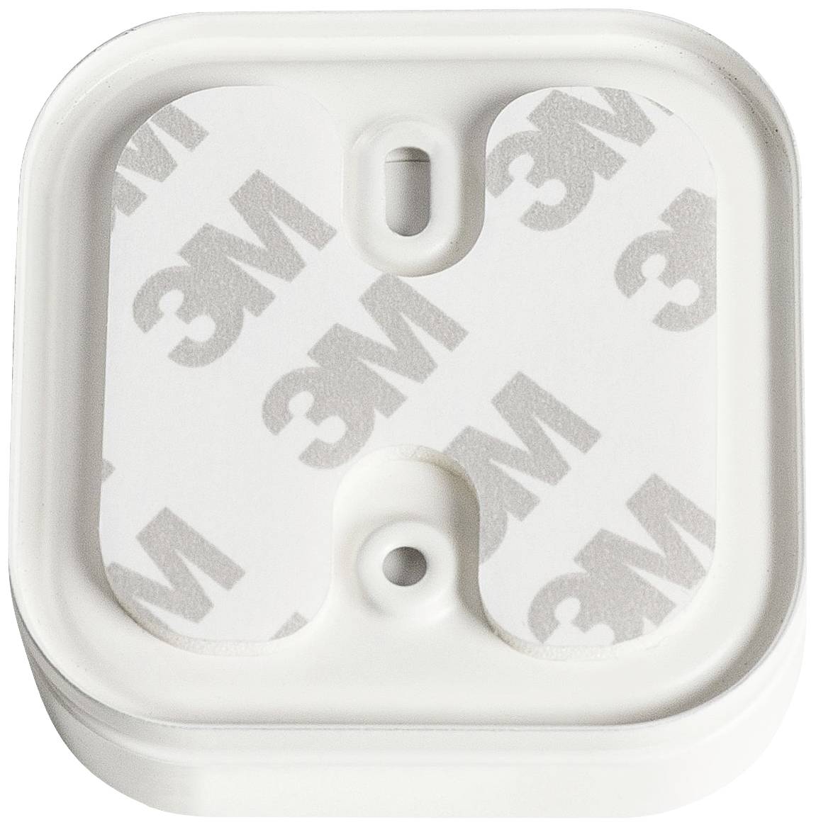 Un tampon adhésif carré blanc de 3M avec film de protection amovible, adapté pour fixer des objets sur des surfaces lisses.