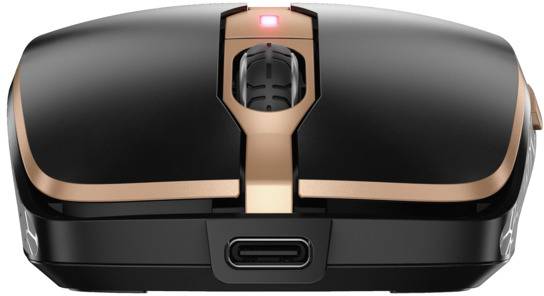 Souris d'ordinateur sans fil noire avec des accents en cuivre et une lumière LED rouge sur le dessus, port de charge visible à l'avant.