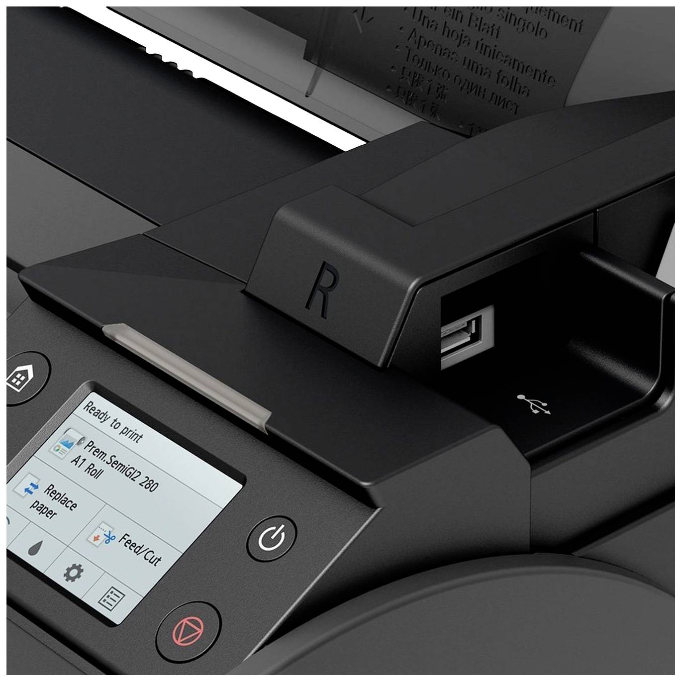 Une imprimante avec un écran affichant le statut d'impression. Port USB et touches de commande visibles. Prête à imprimer, à recharger du papier.