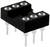 Un socle noir rectangulaire avec six cavités rondes et six broches métalliques en dessous, probablement un composant électronique.
