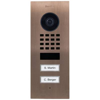Un interphone de couleur bronze avec caméra, haut-parleur et deux plaques de sonnette portant les noms 'S. Martin' et 'C. Berger'.