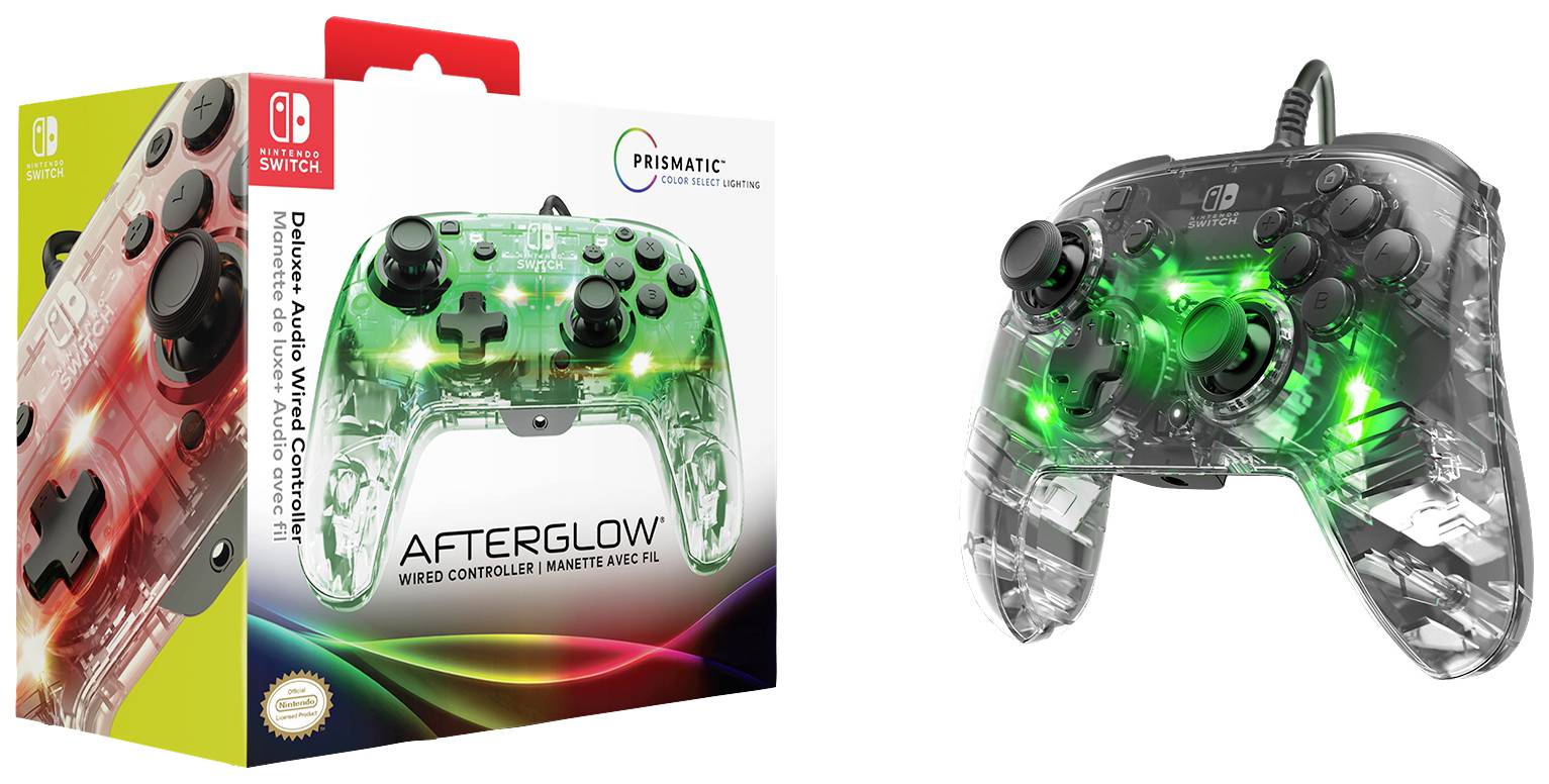 Une console de jeu transparente lumineuse au design en plastique avec un éclairage vert. À côté, l'emballage avec les informations du produit.