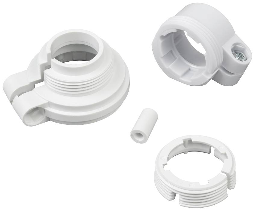 Quatre pièces en plastique blanc, dont un cylindre et trois pièces de raccordement, qui semblent faire partie d'un dispositif plus grand.