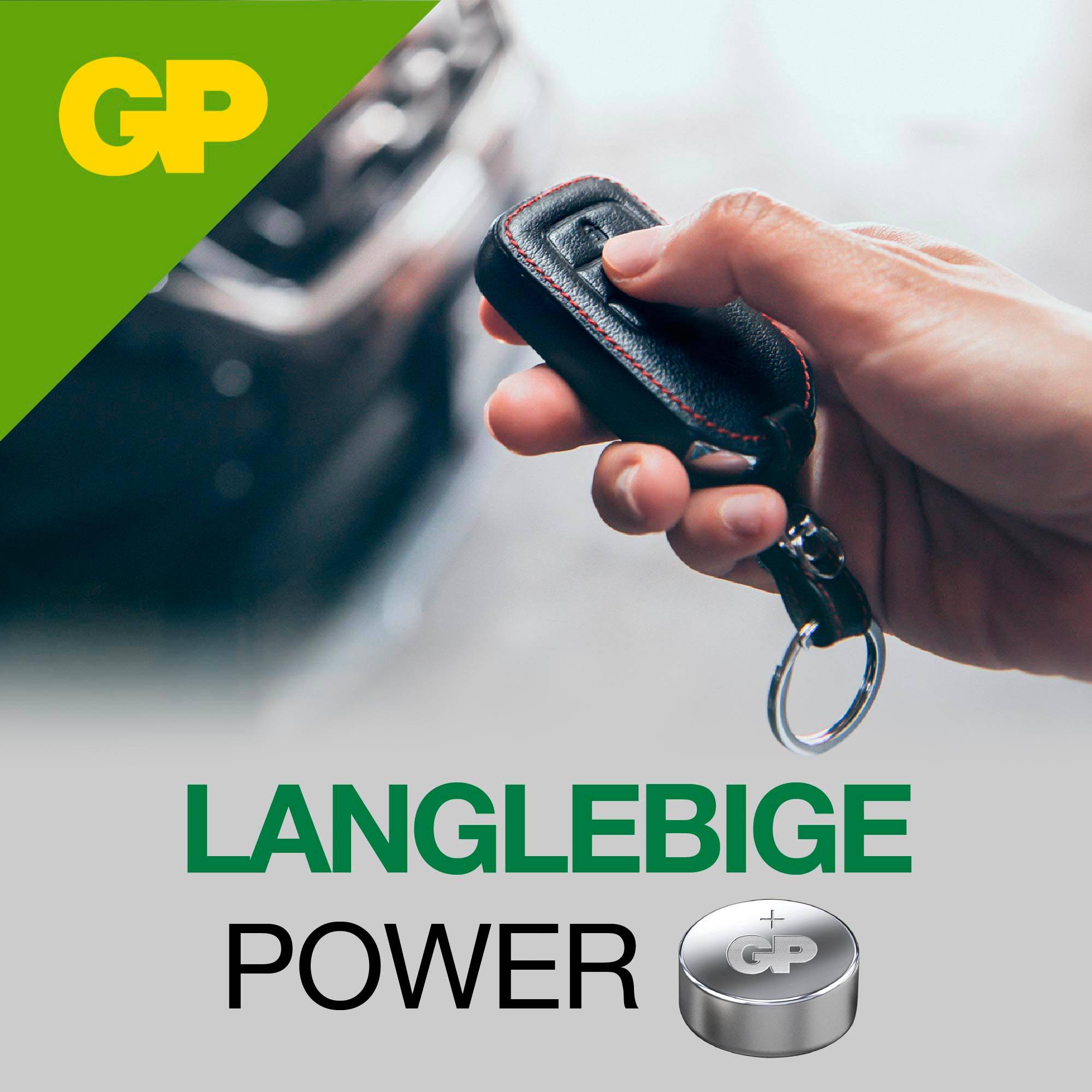 Une main tient une clé de voiture. En haut à gauche se trouve un triangle vert avec les lettres 'GP'. En bas, il est écrit 'Puissance durable'.