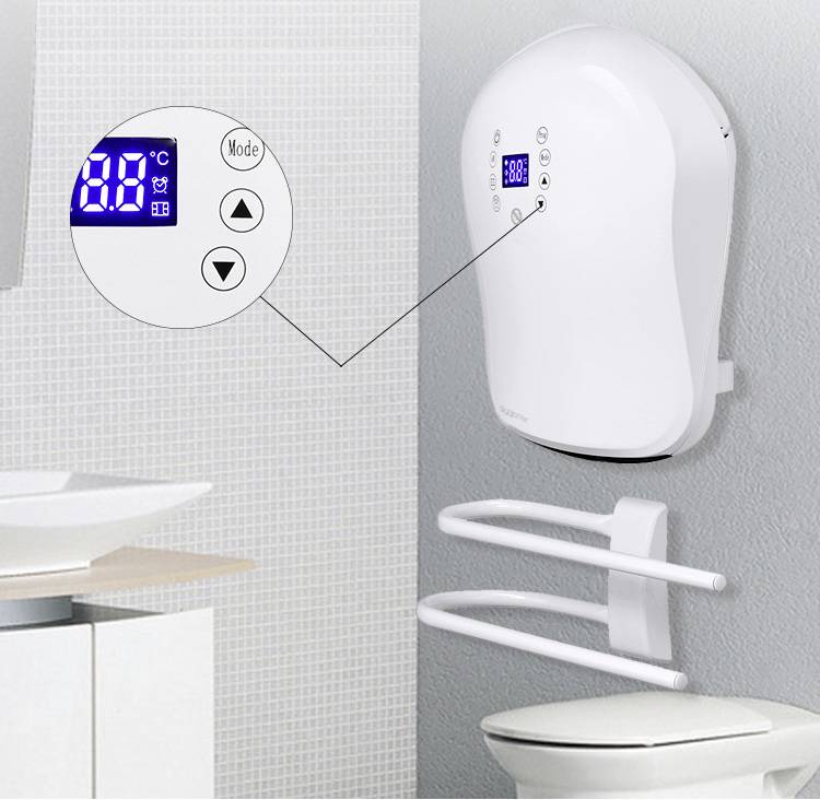 Sèche-serviettes électrique fixé au mur de la salle de bain, équipé d'un écran numérique affichant la température. Commande par touches pour les différents modes et réglages.