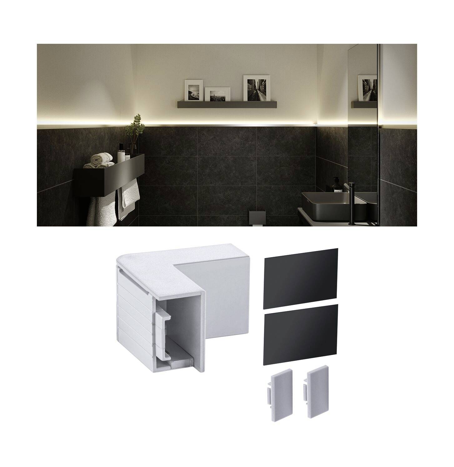 Salle de bain moderne avec des carreaux noirs, étagère éclairée avec des photos, des serviettes et un lavabo. Ensemble d'accessoires en blanc et noir.
