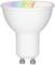 Une ampoule LED présente un dégradé de couleurs arc-en-ciel vers le blanc sur sa surface supérieure.