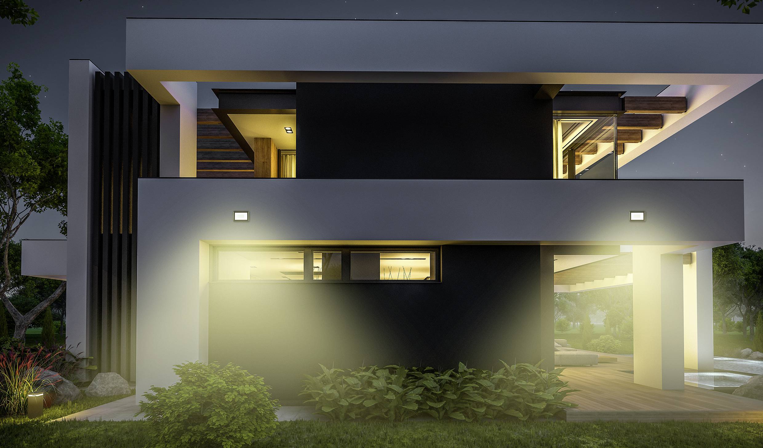 Villa moderne à deux étages avec de grandes fenêtres vitrées, illuminée la nuit. Entourée de nature, avec une architecture épurée et élégante.