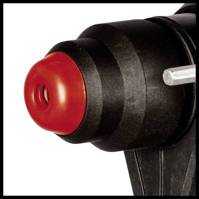 Un bouton-poussoir rouge sur un boîtier noir, probablement un bouton d'arrêt ou un bouton d'arrêt d'urgence sur un appareil ou une machine.
