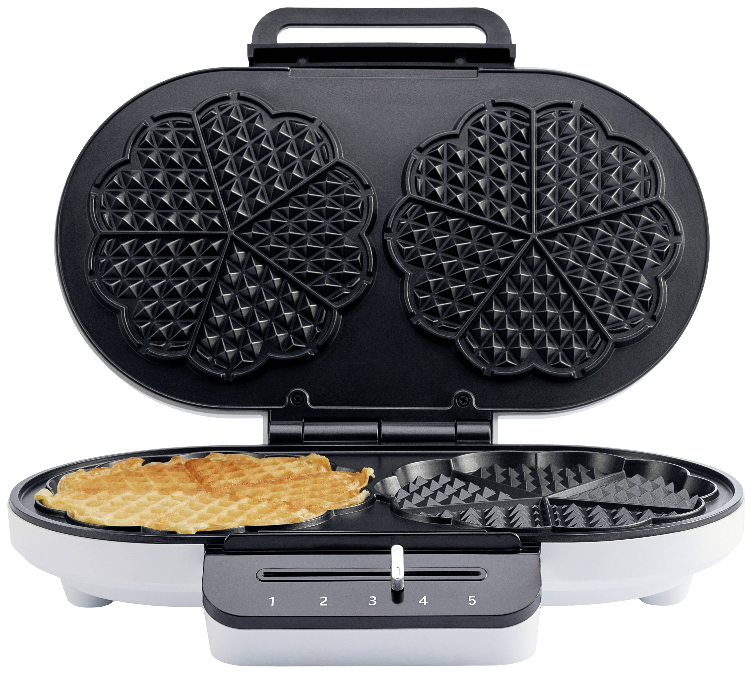 Un gaufrier avec une gaufre partiellement cuite sur la plaque de gauche. L'appareil dispose de cinq niveaux de température.
