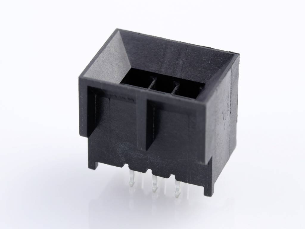 Connecteur noir avec plusieurs broches métalliques sur sa face inférieure, utilisé pour les connexions électroniques.