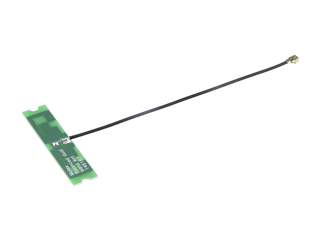 Une petite antenne plate avec un câble noir et un connecteur doré, adaptée aux connexions sans fil dans les appareils.