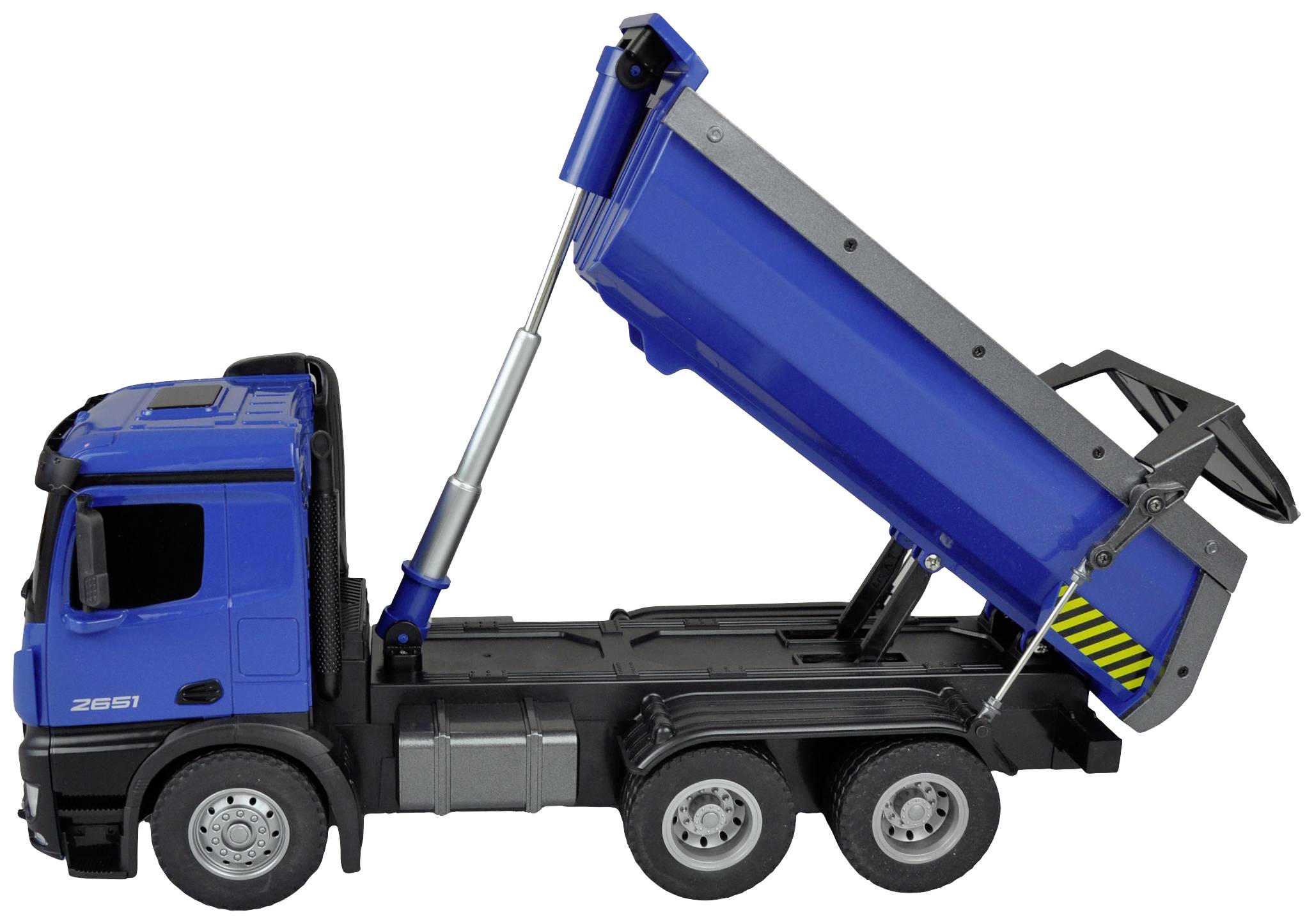 Un camion benne bleu avec une benne relevée, reposant sur des vérins hydrauliques, est visible de côté.