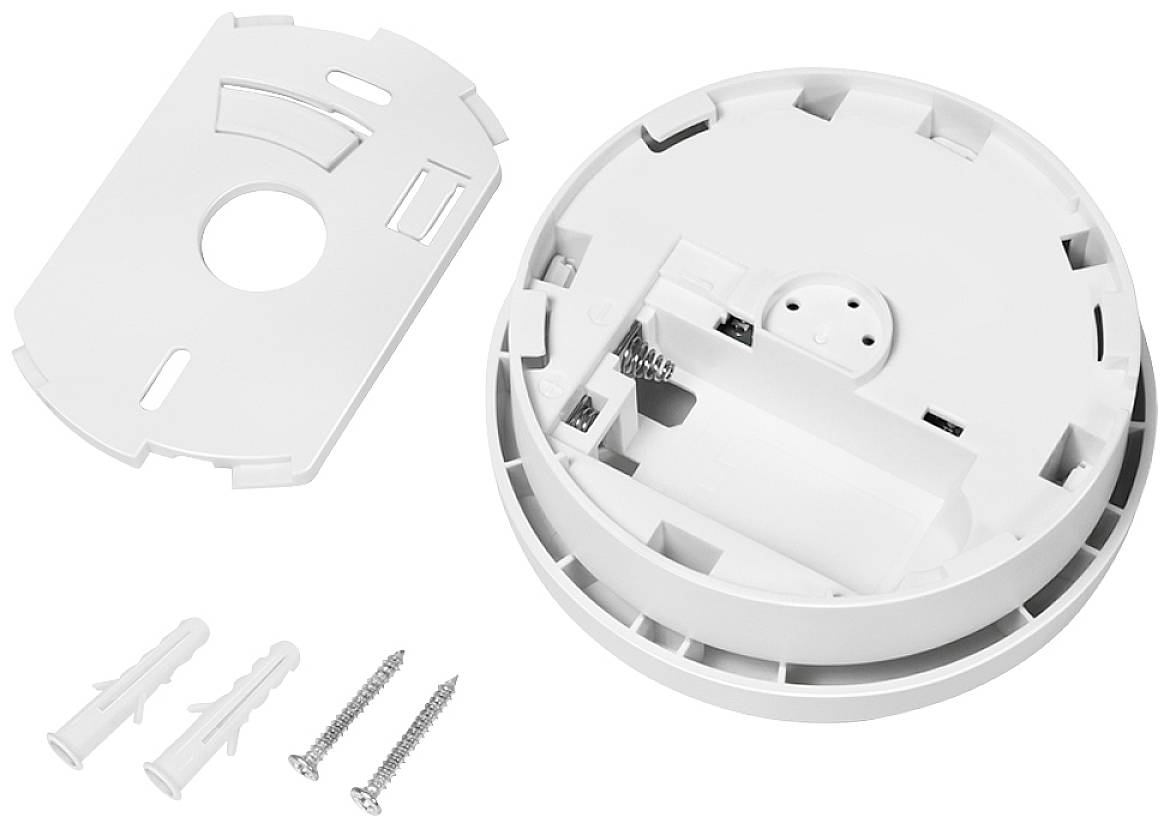 Détecteur de fumée avec boîtier blanc retiré, deux vis et chevilles de fixation murale visibles sur l'image.