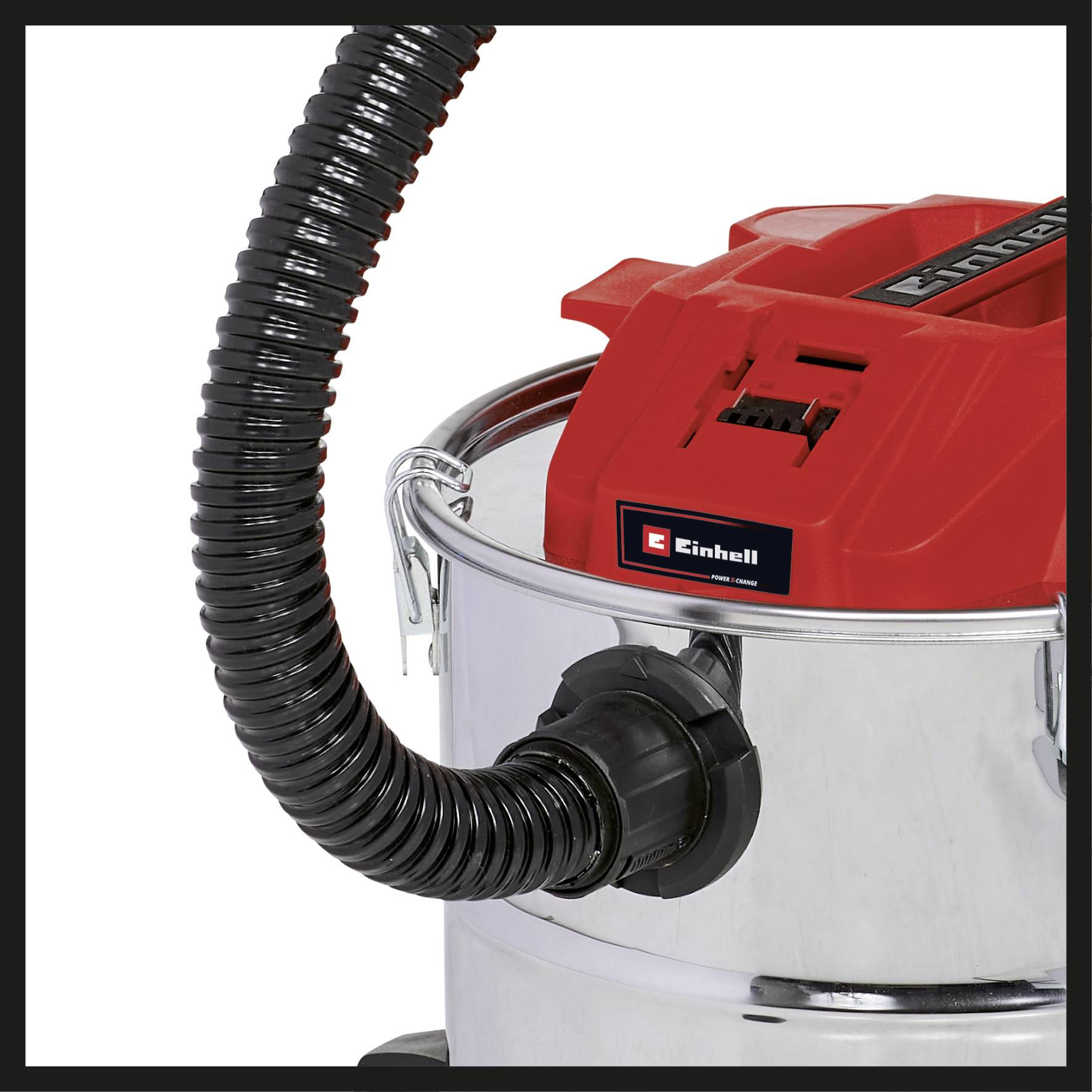 Un aspirateur rouge et argenté avec un tuyau flexible. Le logo 'Einhell' est visible sur la face avant.