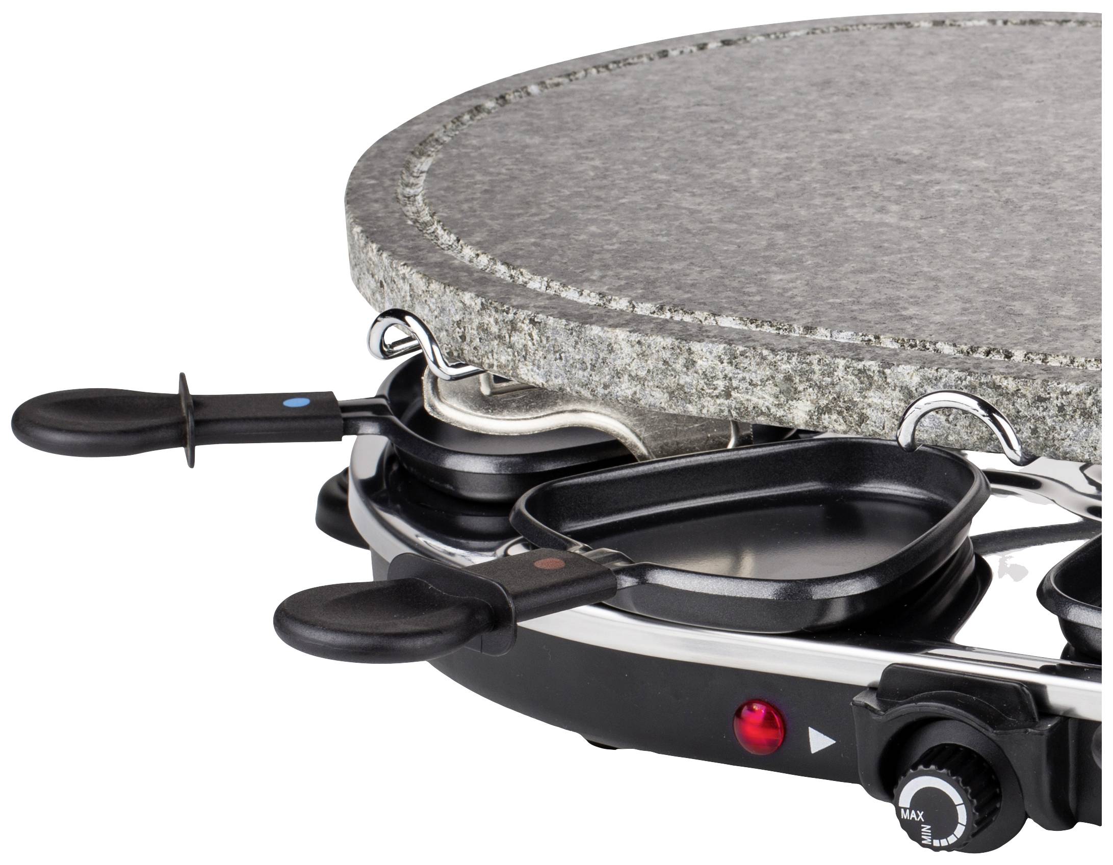 Appareil à raclette avec plaque en pierre et deux petites poêles en dessous, régulateur de température et témoin lumineux sur le devant. Idéal pour griller.