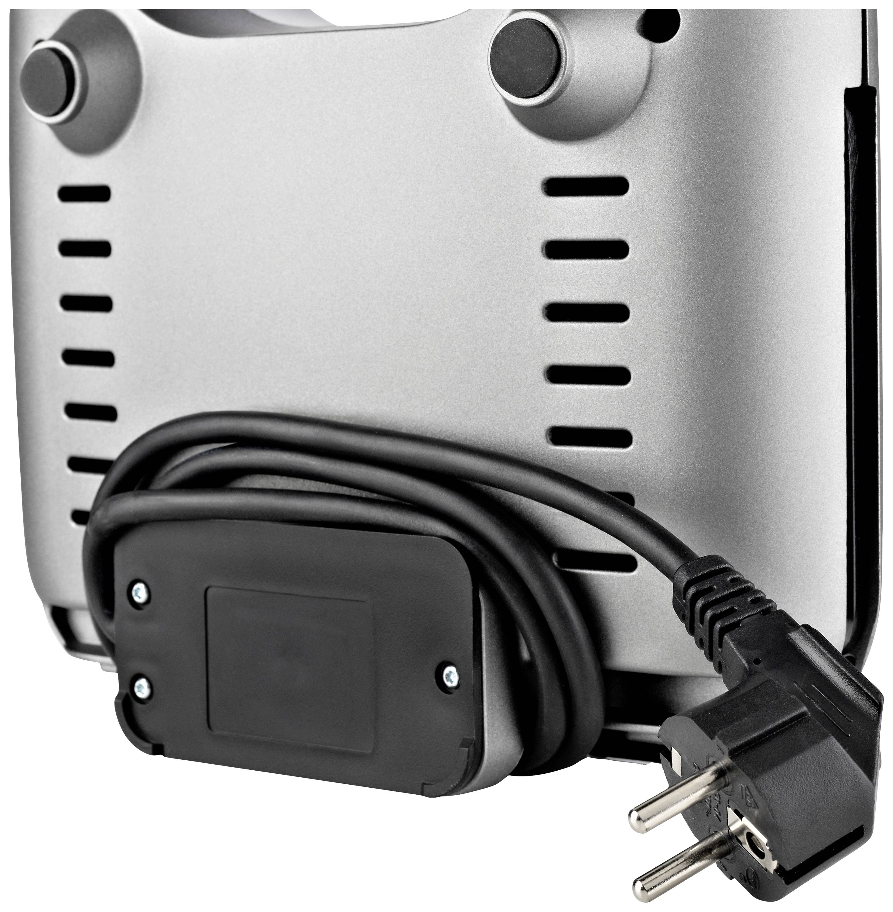 Vue arrière d'un grille-pain argenté avec un câble noir soigneusement enroulé sous l'appareil.