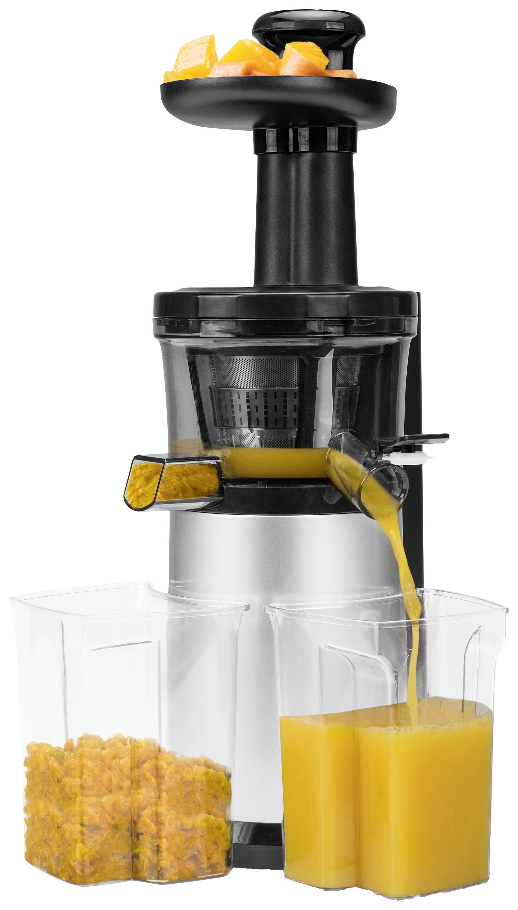 Extracteur de jus avec sortie de jus, jus frais et morceaux de fruits dans des récipients. L'ensemble en noir et argent.
