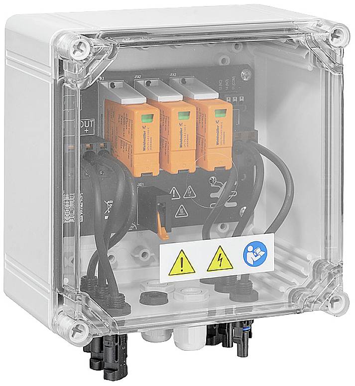 Armoire électrique avec trois fusibles orange et des symboles d'avertissement de haute tension sur la façade.