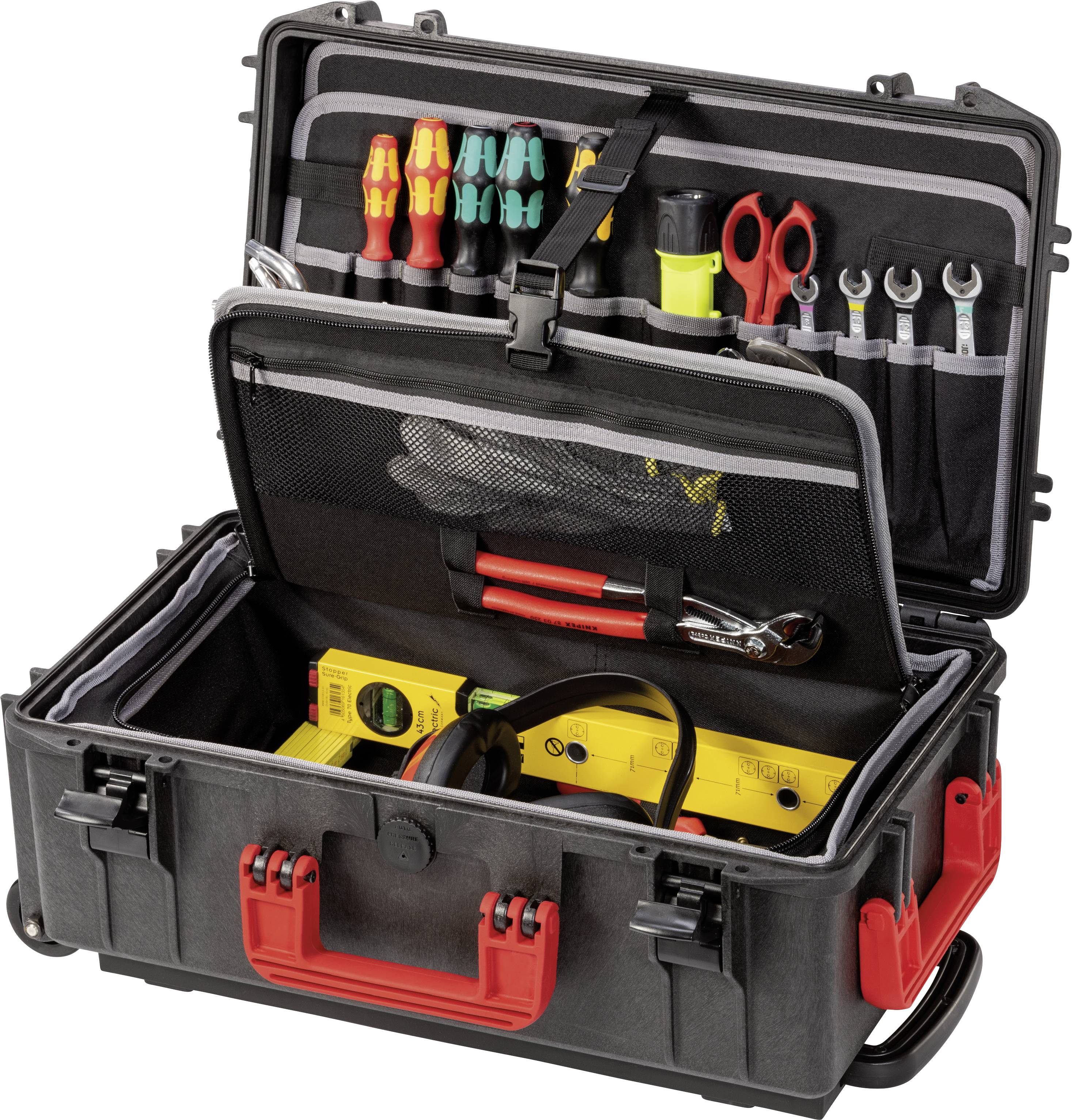 Boîte à outils ouverte contenant des tournevis, des pinces, des clés et des appareils de mesure. Service de matériel électrique.