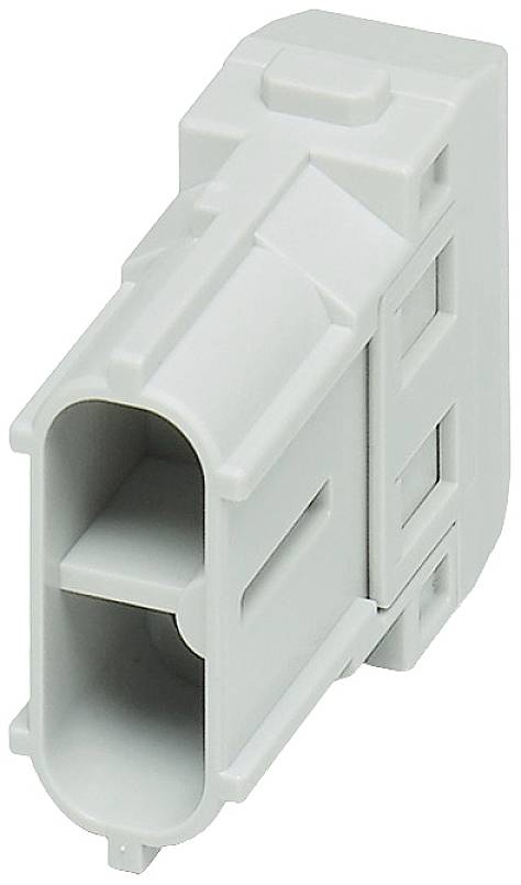 L'image montre un boîtier rectangulaire gris en plastique avec des ouvertures de connexion, probablement un module de connexion électrique.