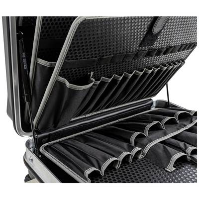 Boîte à outils ouverte avec de nombreux supports élastiques à l'intérieur, adaptée au rangement organisé des outils.