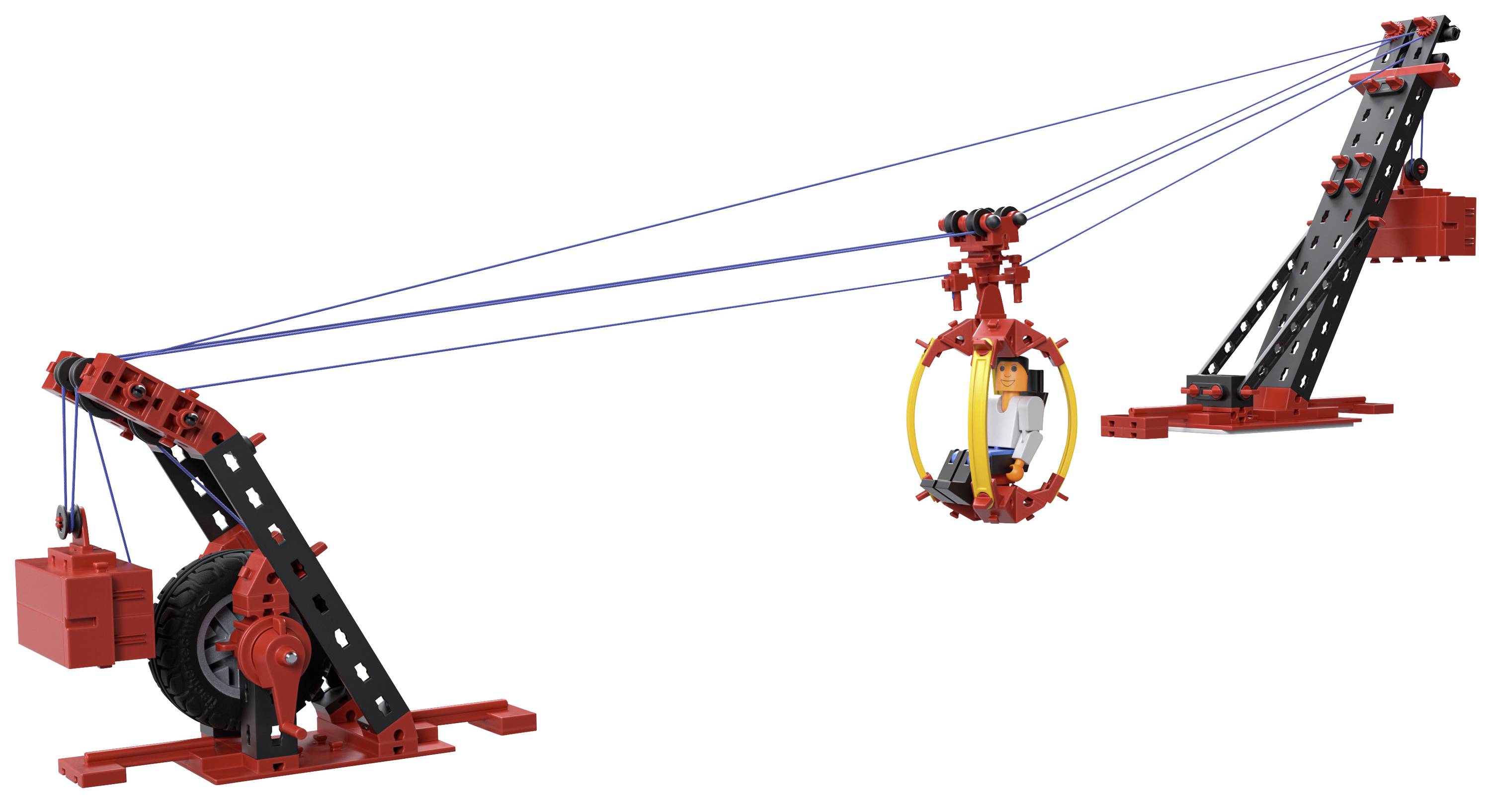 Grue modèle construite en blocs soulevant une petite figurine dans un anneau jaune. La grue est composée de pièces rouges et noires.
