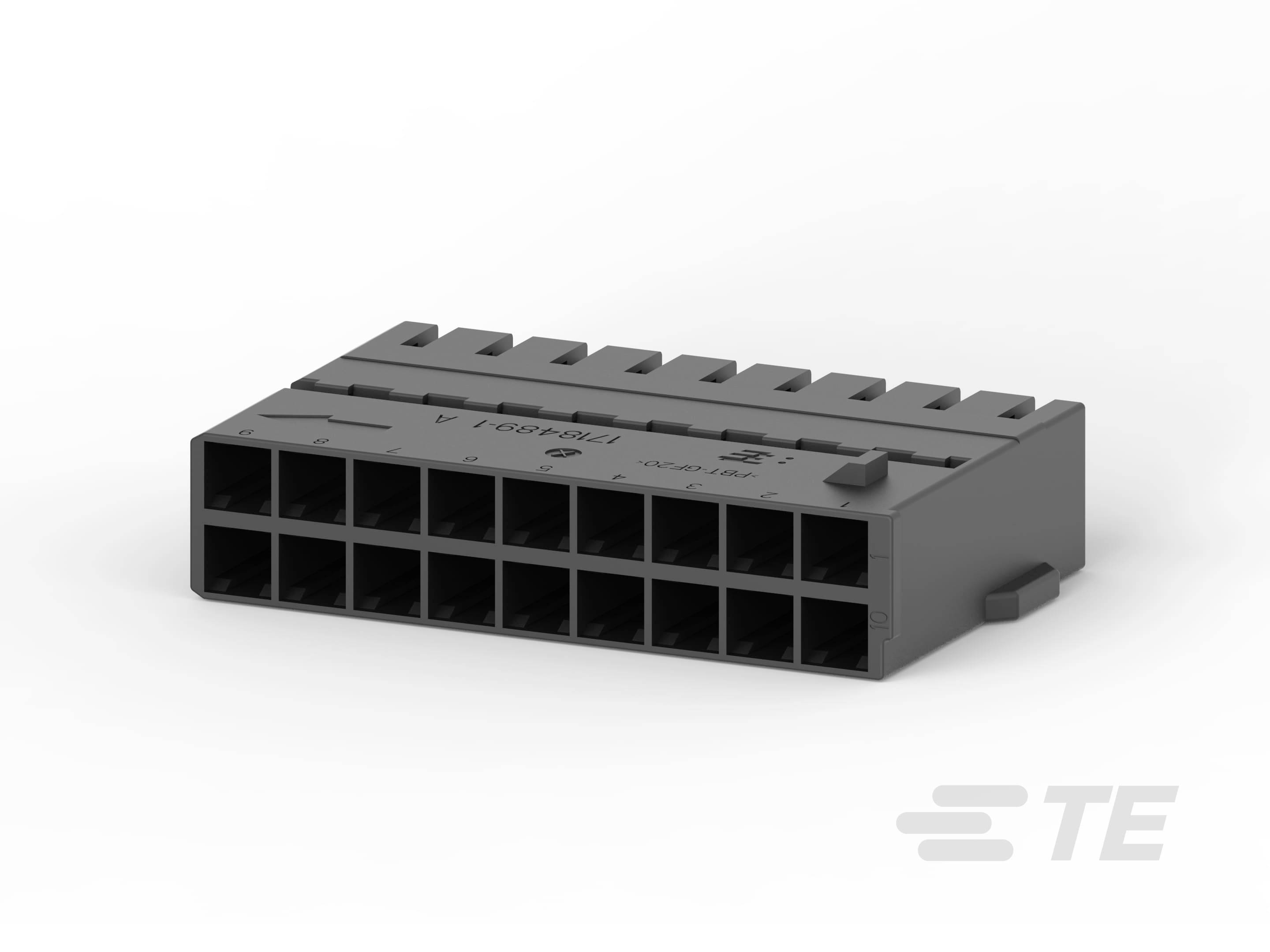 Une prise électronique noire avec deux rangées d'ouvertures de contacts, adaptée pour la connexion dans des appareils électroniques.