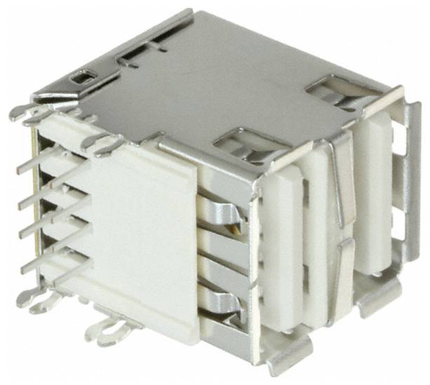 Un composant électronique argenté et blanc avec plusieurs broches, probablement un connecteur USB, utilisé pour connecter des câbles aux appareils.