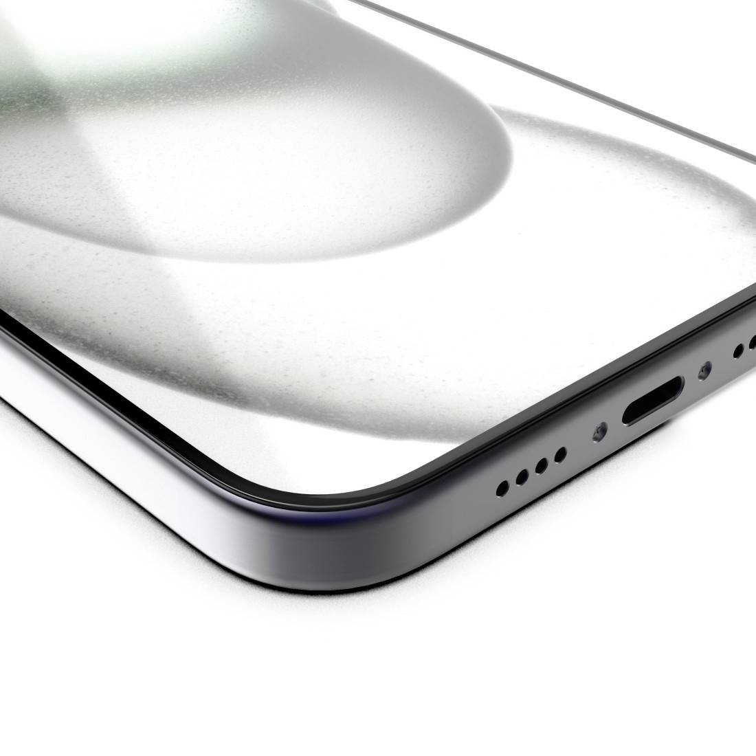 Gros plan sur un coin de smartphone moderne avec un écran en verre brillant et une ouverture de haut-parleur sur le côté.