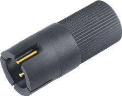 Un connecteur noir cylindrique à surface striée et contacts dorés pour connexions électriques.