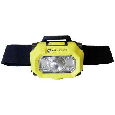 Lampe frontale jaune avec bandeau noir. Sur la lampe est inscrit 'KSE-LIGHTS'. Elle possède une grande lentille et une forme rectangulaire.